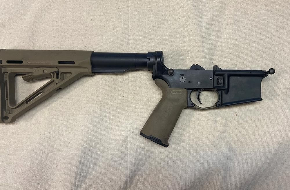 An illegal home-built rifle DURING firearm destruction in California.