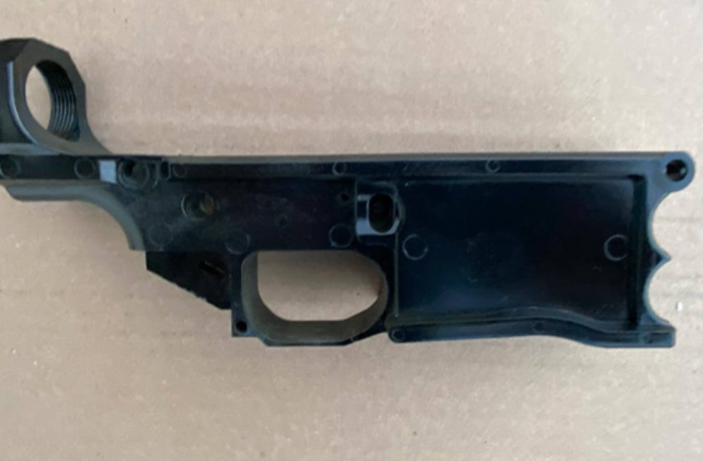 An illegal home-built rifle DURING (PART 2) firearm destruction in California.